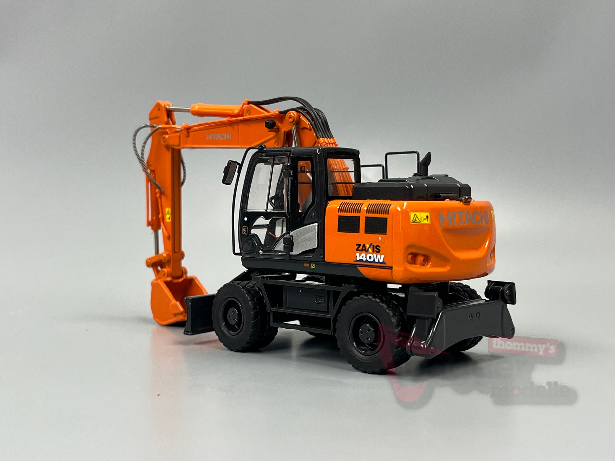 7304 -TMC - Hitachi ZX 140W-6 Mobilbagger
