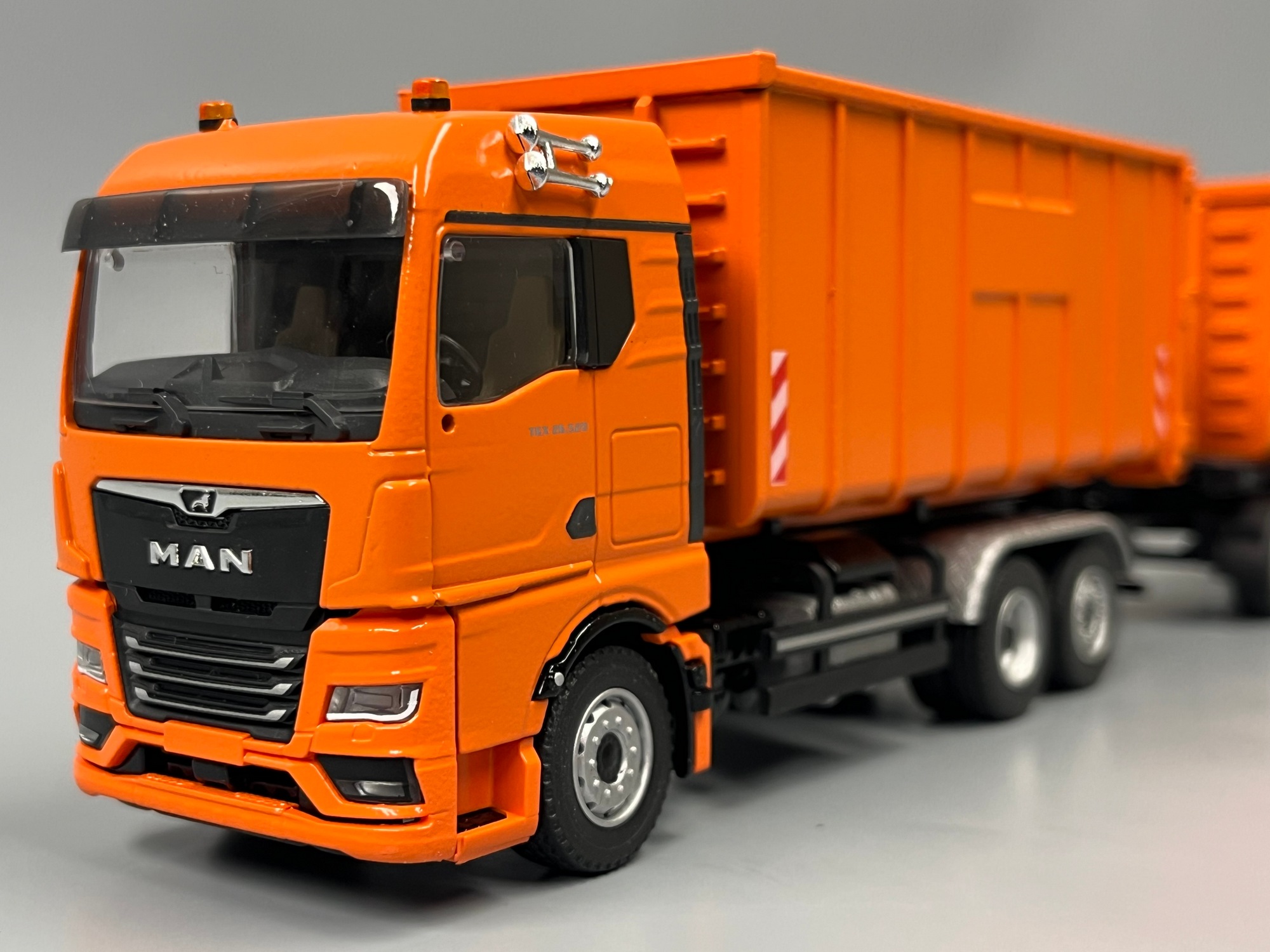 10019-1 - Conrad - Meiler Abrollkipper auf MAN TGX GM und Roll Carrier" Hängerzug  - Kommunal