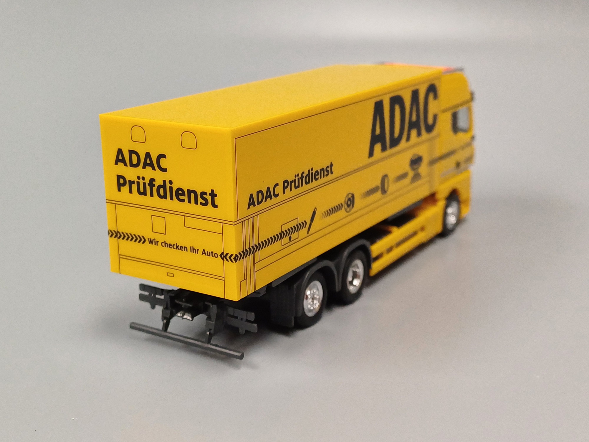 317986 - Herpa - MAN TGX GX Wechselkoffer-LKW "ADAC Prüfdienst"