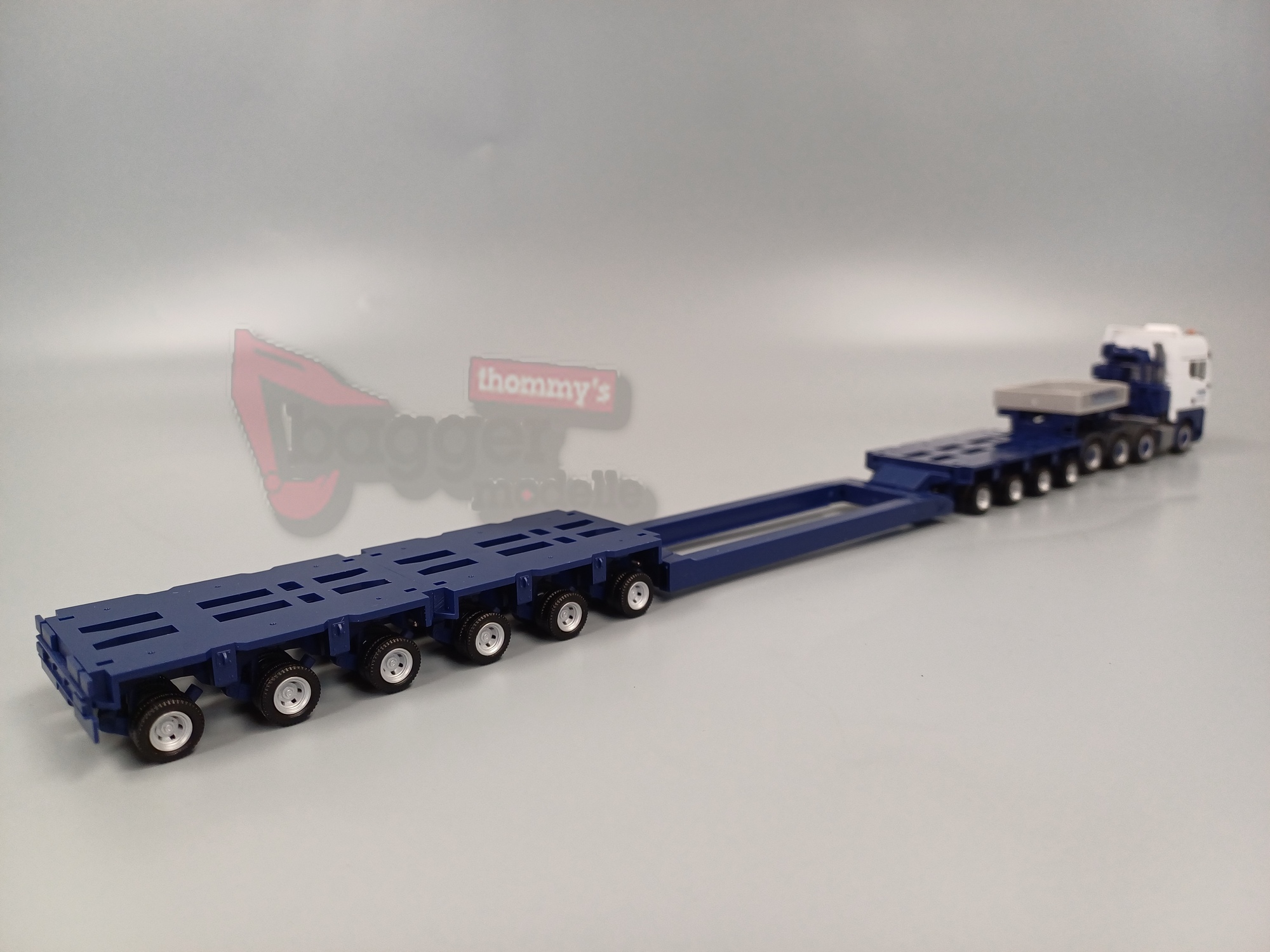 318839 - Herpa - MAN TGX GX Tieflade-Sattelzug  Tieflader 10 achs  "Wasel"