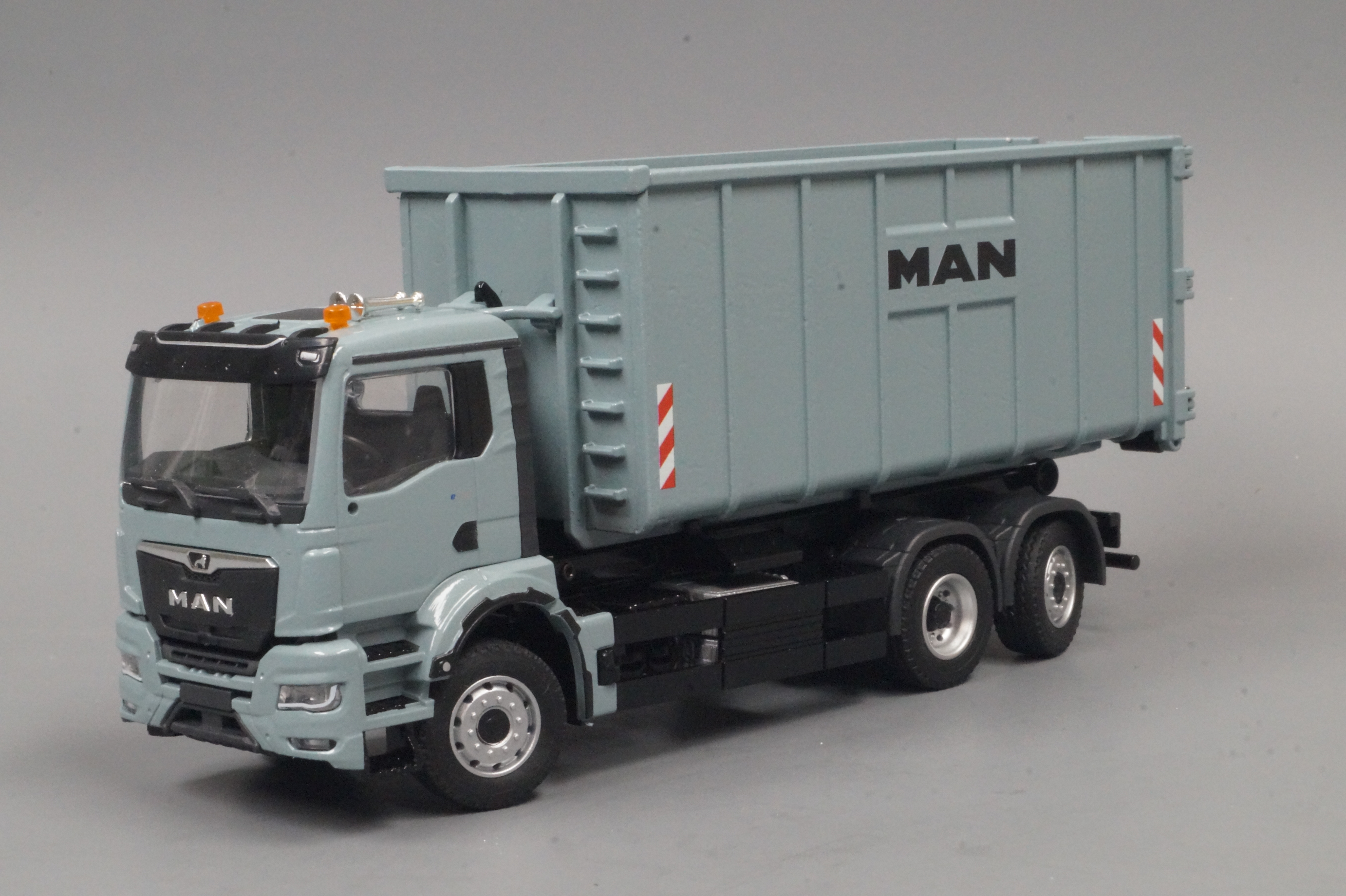 81217E -Conrad - MAN TGS TN Meiller Abrollkipper  anthrazit metallic