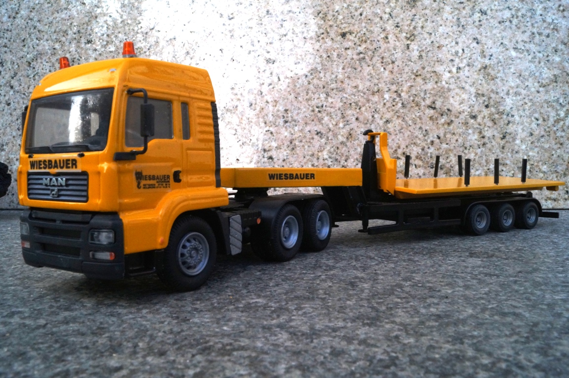 MAN 3achs mit 3achs Abrollkipper auf Plattform "Wiesbauer"