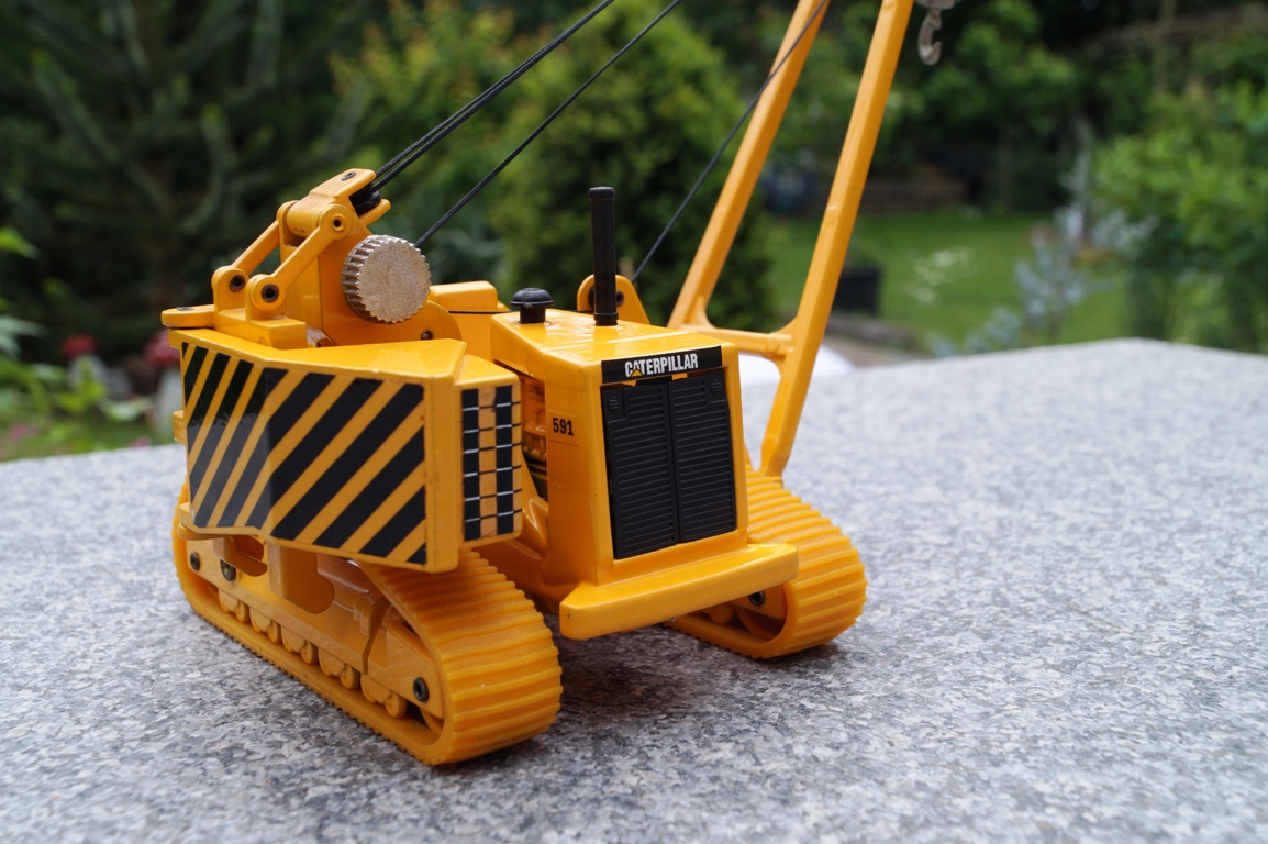 CAT 591 Rohrleger mit Haken