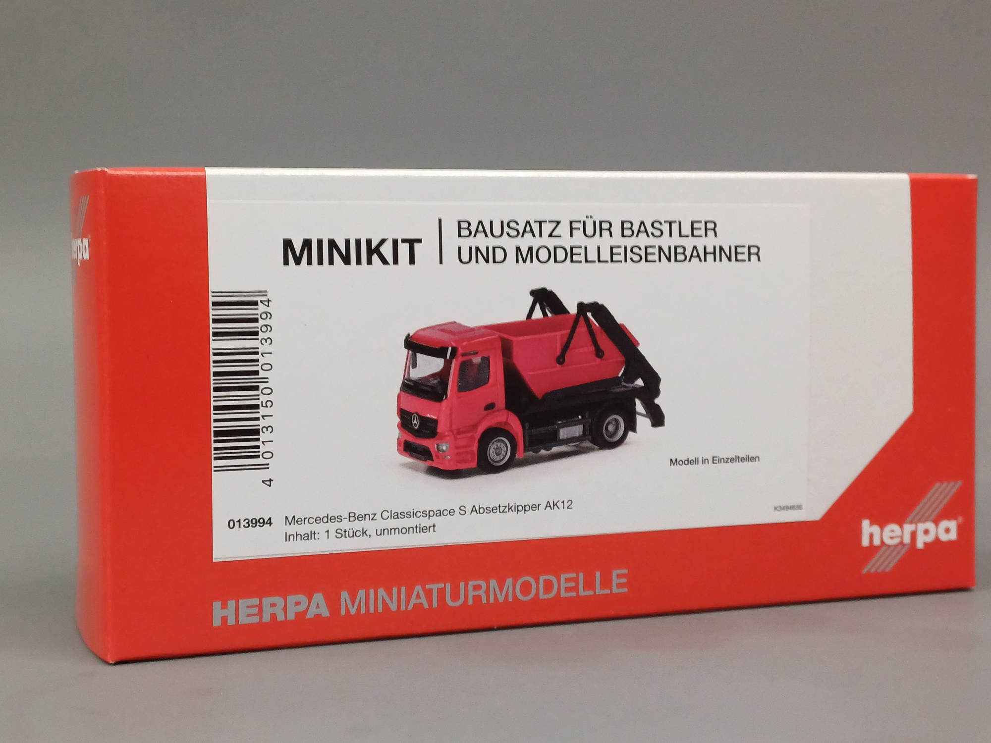 013994 - Herpa -  MiniKit: Mercedes-Benz Actros S Absetzkipper AK12, rot  Bausatz