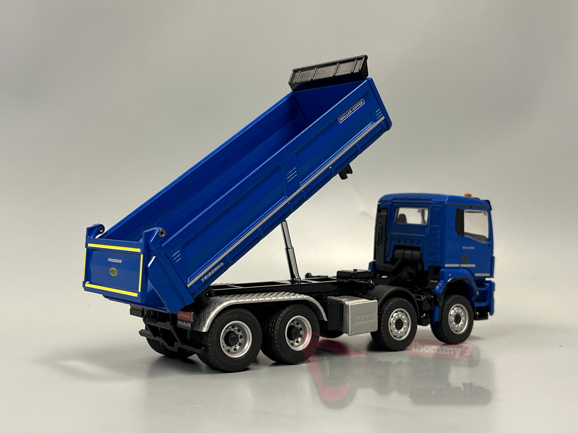 81255-5 - Conrad - MAN TGS NN 41.520 Meiller Trigenius Dreiseitenkipper blau