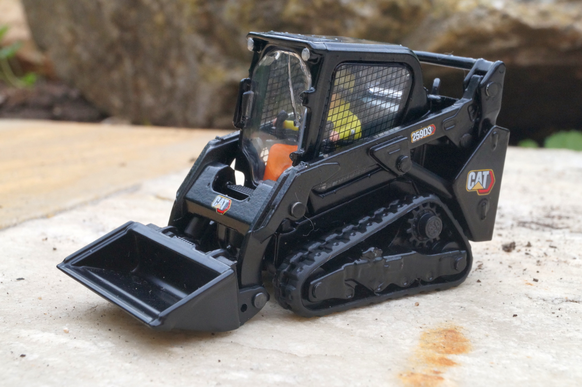 85677BK - DCM - Cat 259 D3 Kompaktlader auf Kette   "Black Edition"