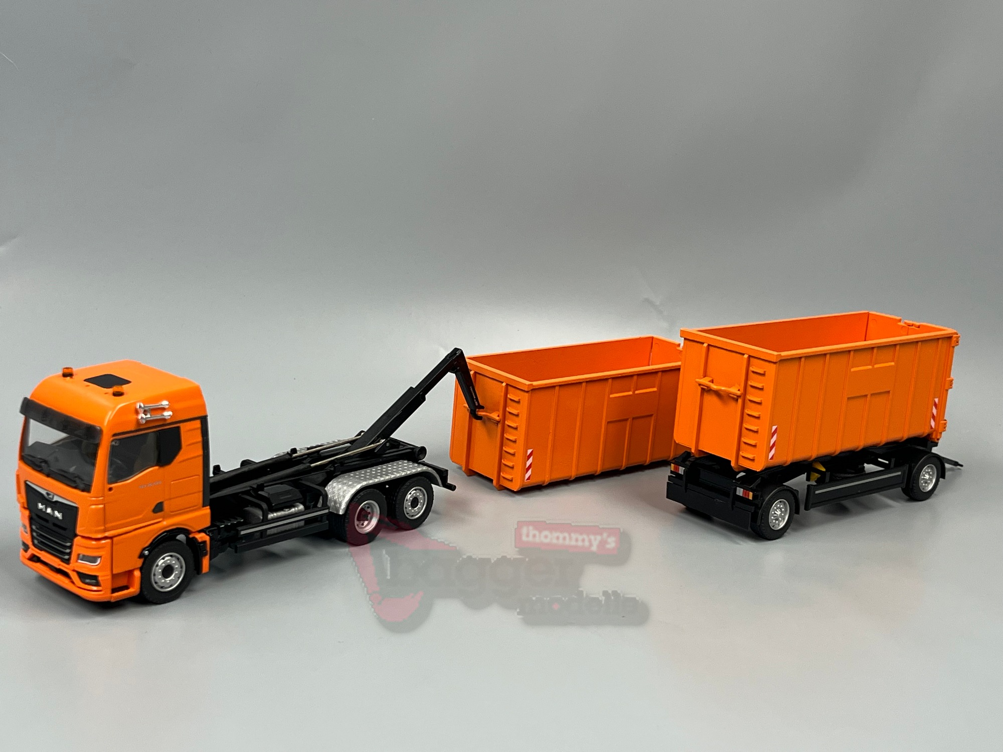 10019-1 - Conrad - Meiler Abrollkipper auf MAN TGX GM und Roll Carrier" Hängerzug  - Kommunal