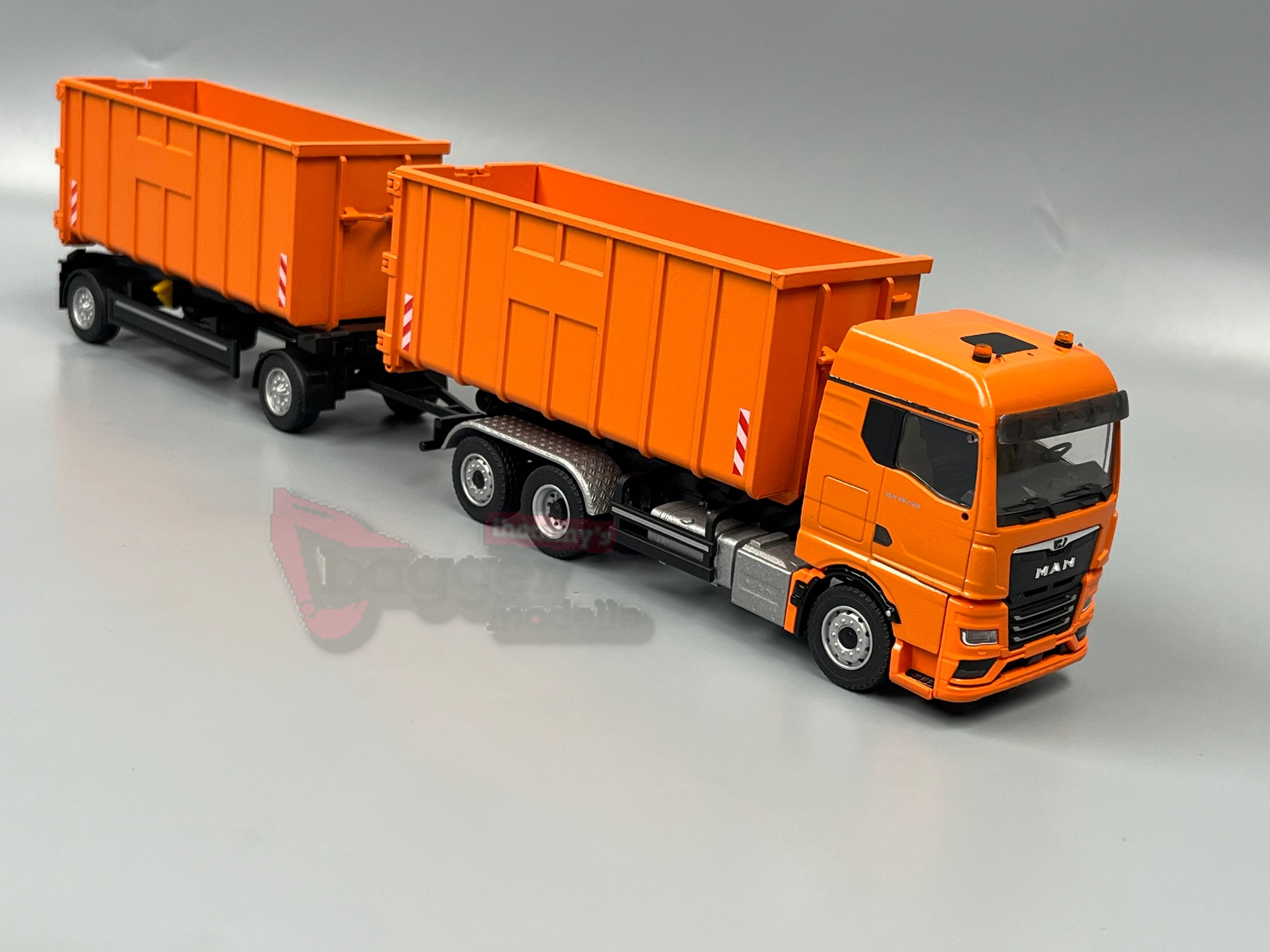 10019-1 - Conrad - Meiler Abrollkipper auf MAN TGX GM und Roll Carrier" Hängerzug  - Kommunal