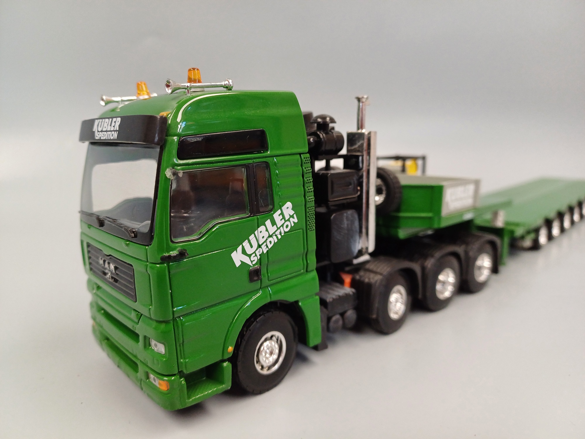 694- MAN 4achs mit 8 achs  Semi Tieflader  Kübler