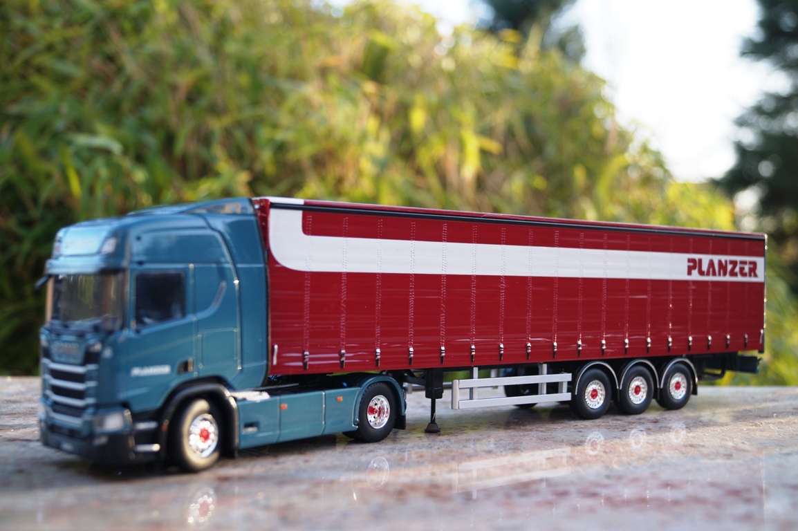 75294 - Tekno - Scania NG R-serie Highline mit Schiebeplanen-Auflieger " Planzer"