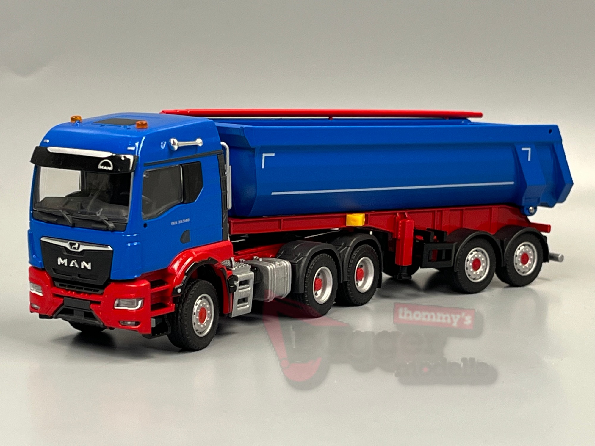 Conrad Man Shell 81265 - Conrad - MAN TGS TM 33.540 Schwarzmüller Kippsattelzug blau