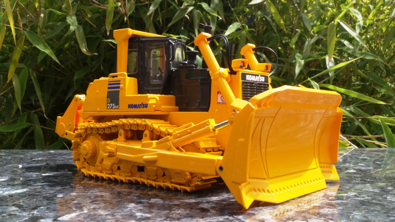 503341 - First Gear - Komatsu Raupe D275AX-5 mit Sigma-Schild und Aufreisser