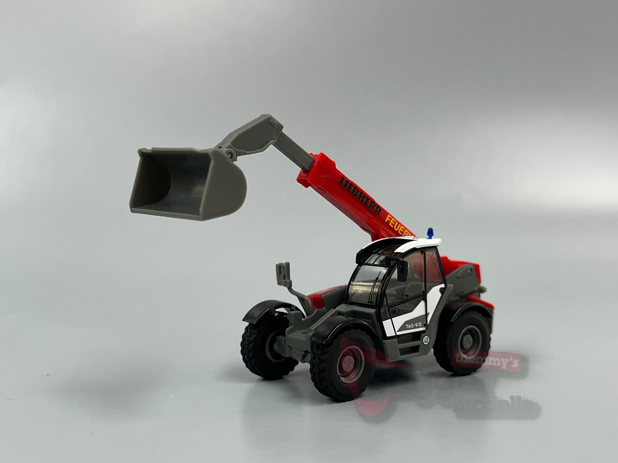 098700 - Herpa - Liebherr Teleskoplader T60-9S "Feuerwehr"