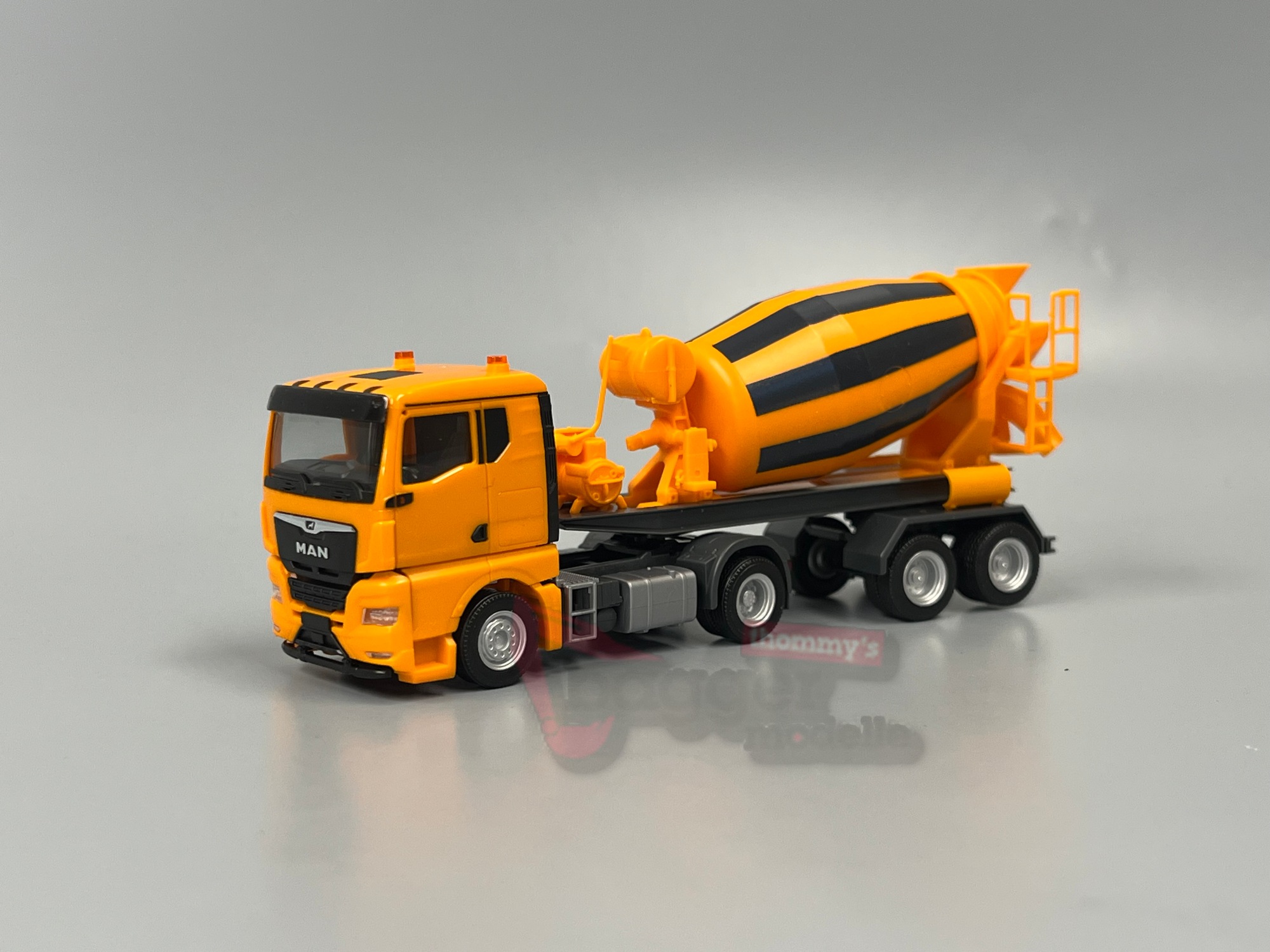 320573 - Herpa - MAN TGX GN Betonmischer-Sattelzug 2achs/2achs, kommunalorange