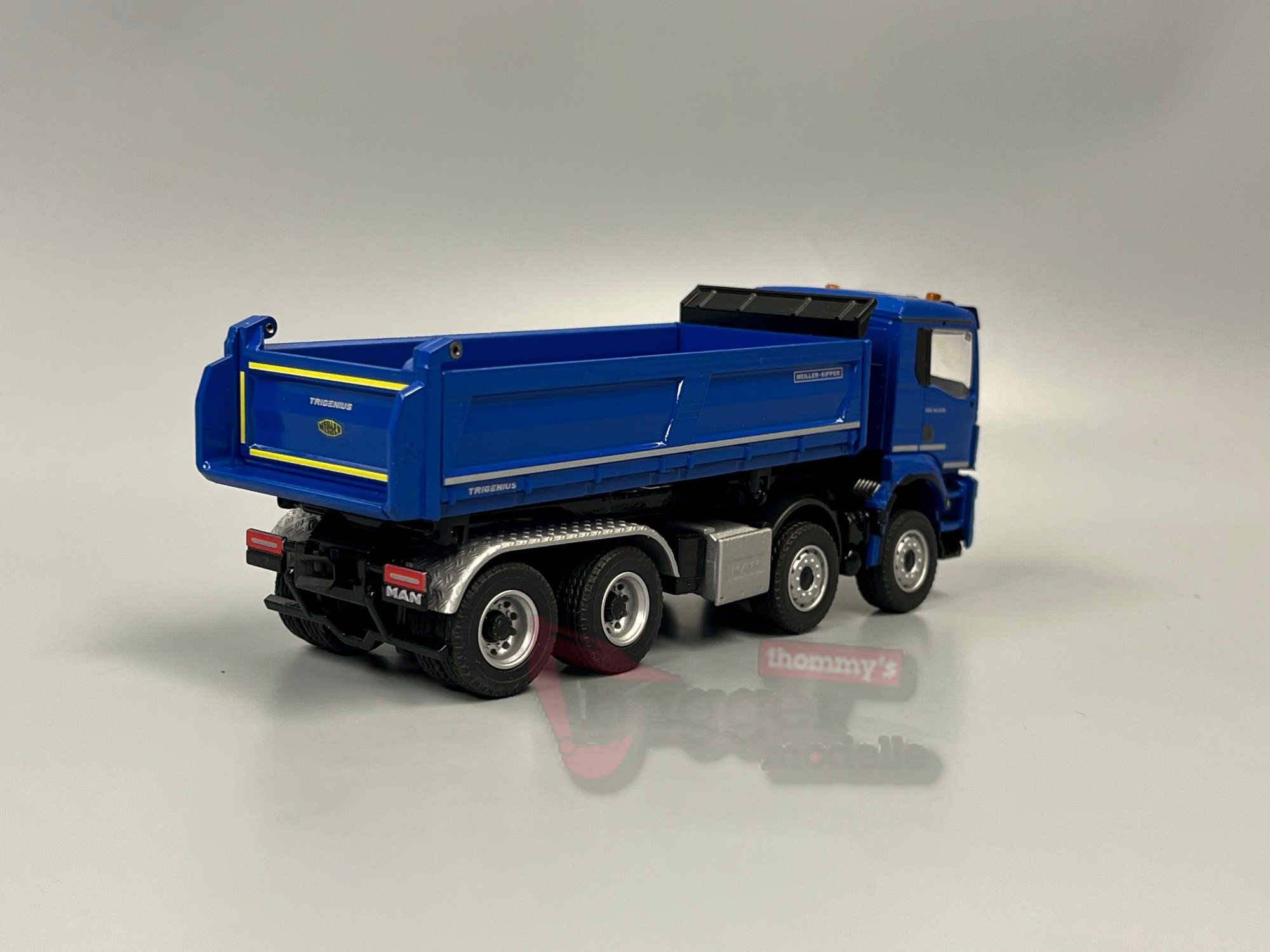 81255-5 - Conrad - MAN TGS NN 41.520 Meiller Trigenius Dreiseitenkipper blau