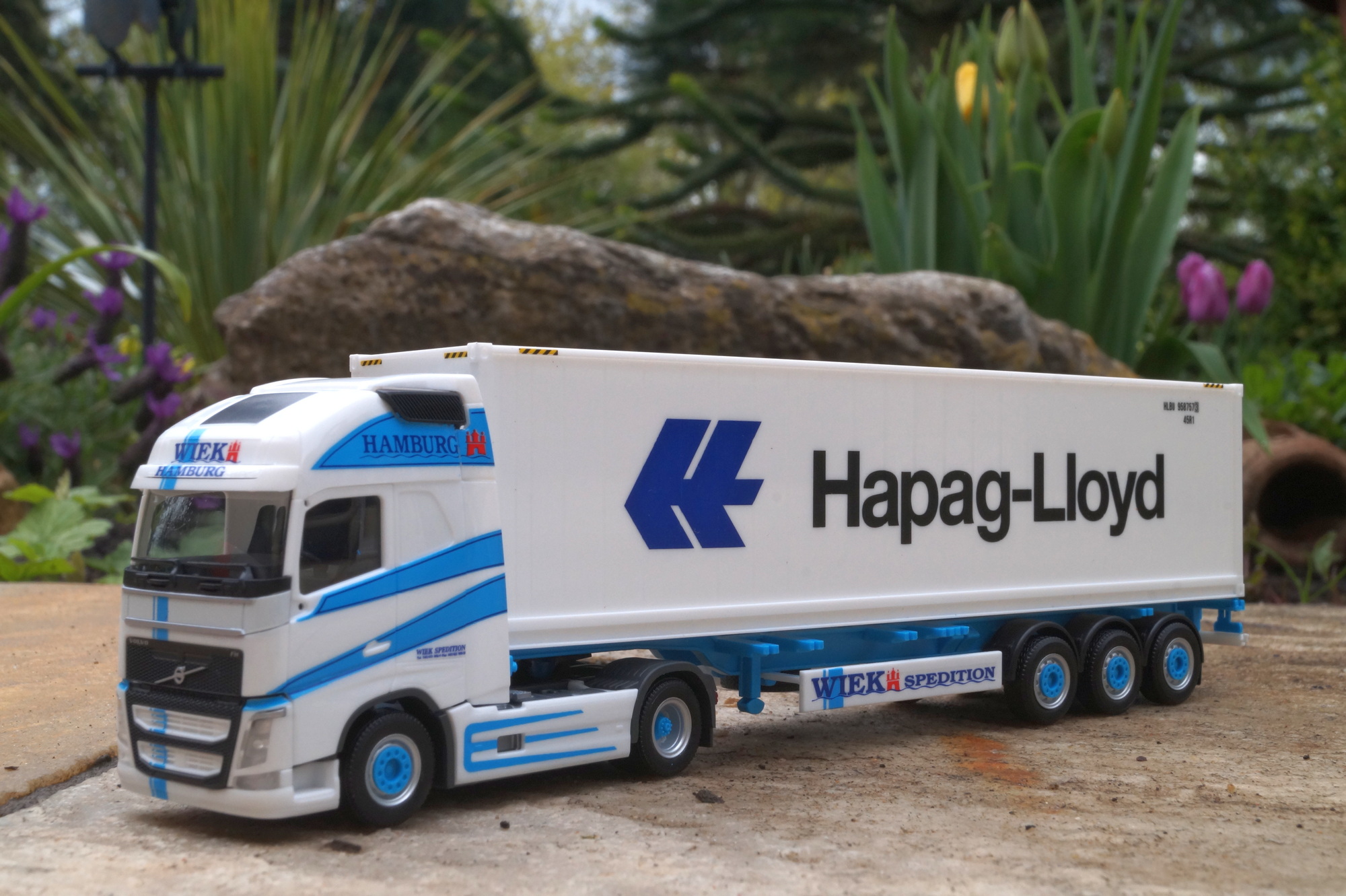 314848 - Herpa - Volvo FH4 Globetrotter XL 40ft. Container-Sattelzug - Wiek / Hapag Lloyd