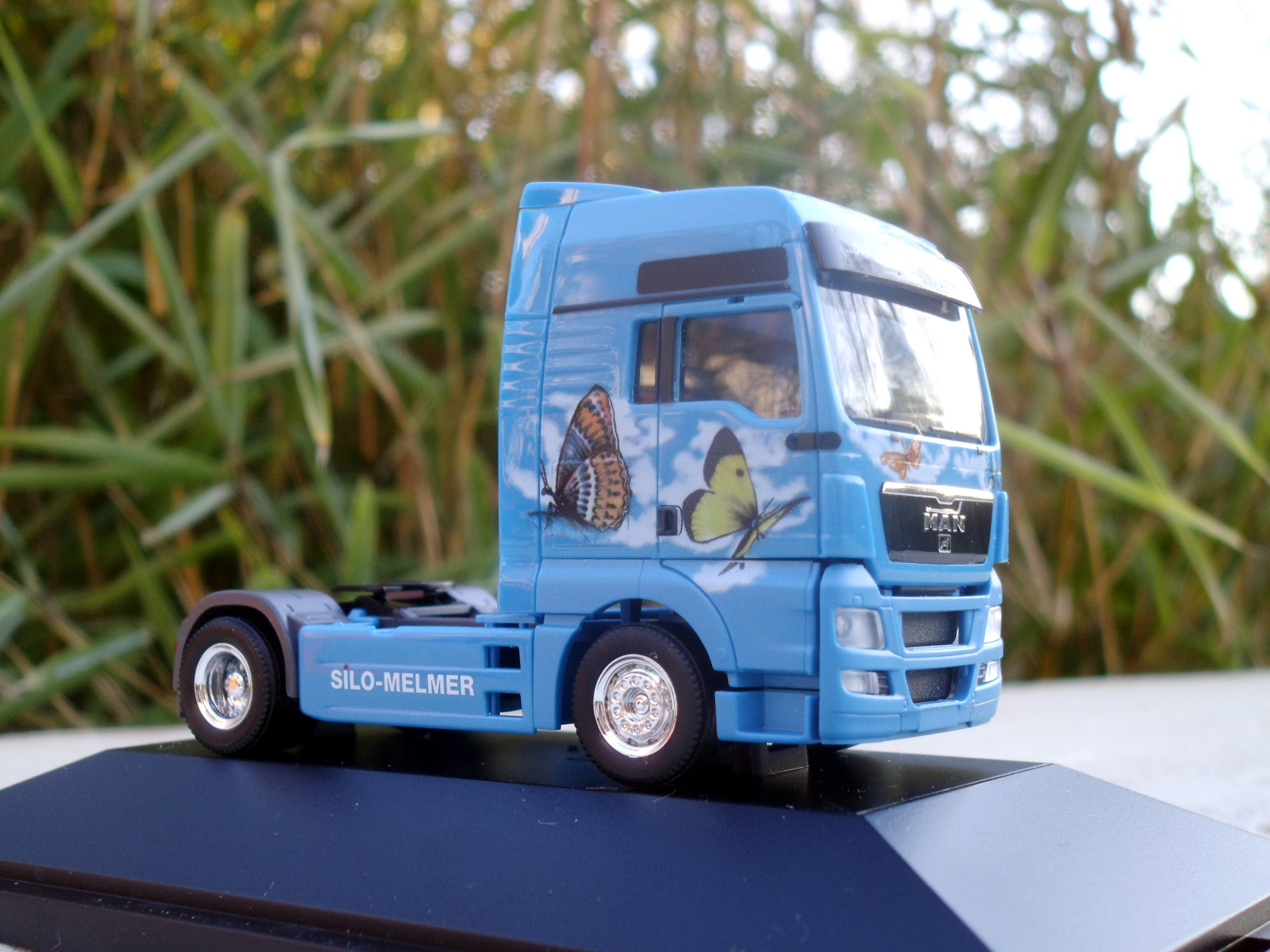 110600 - Herpa  - MAN TGX XXL Zugmaschine" Melmer Kinder"