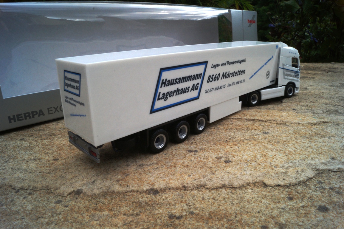 927925 - Herpa - Volvo FH GL Kühlkoffer Sattelzug "Hausamann CH"