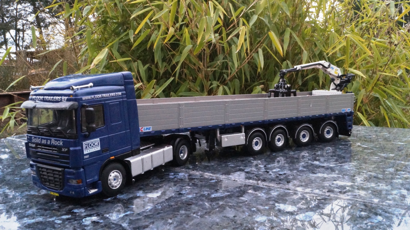 DAF 2achs mit Steinauflieger  " Floor Trailers"