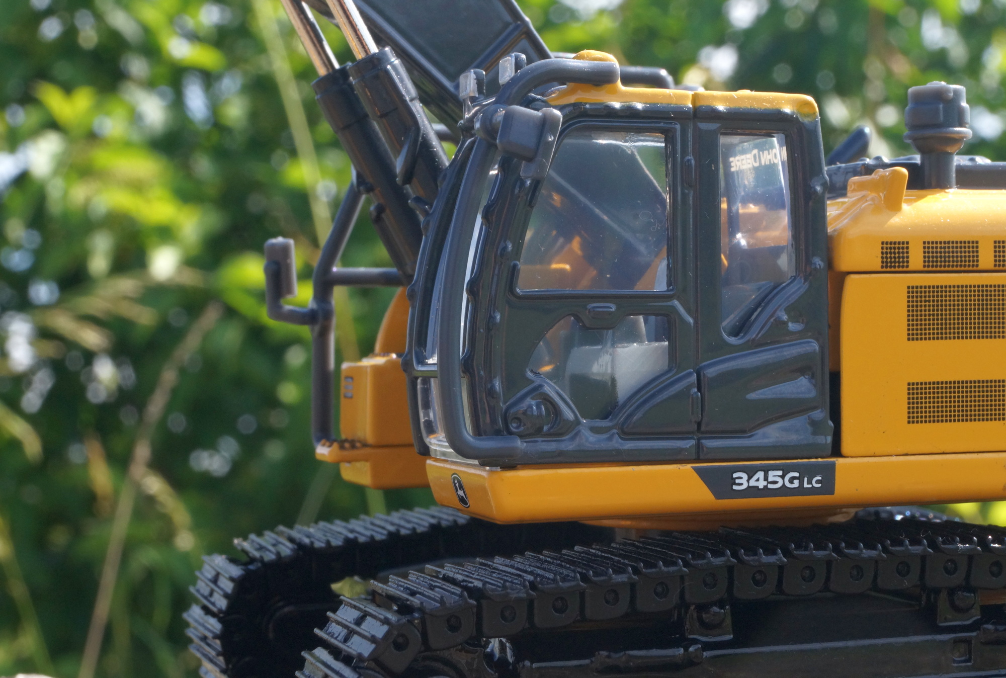 45640 - Ertl -John Deere 345G Kurzheckbagger