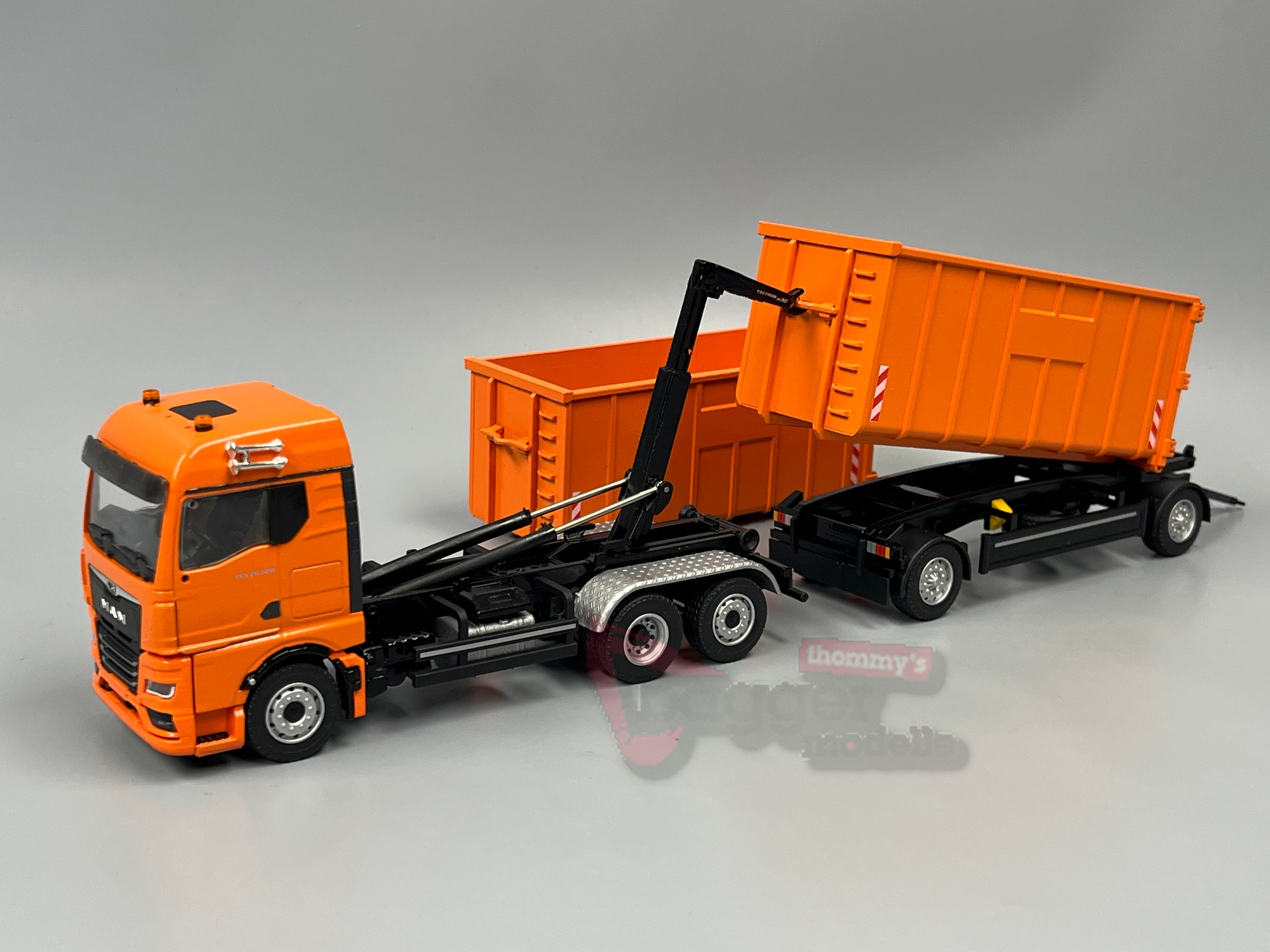 10019-1 - Conrad - Meiler Abrollkipper auf MAN TGX GM und Roll Carrier" Hängerzug  - Kommunal