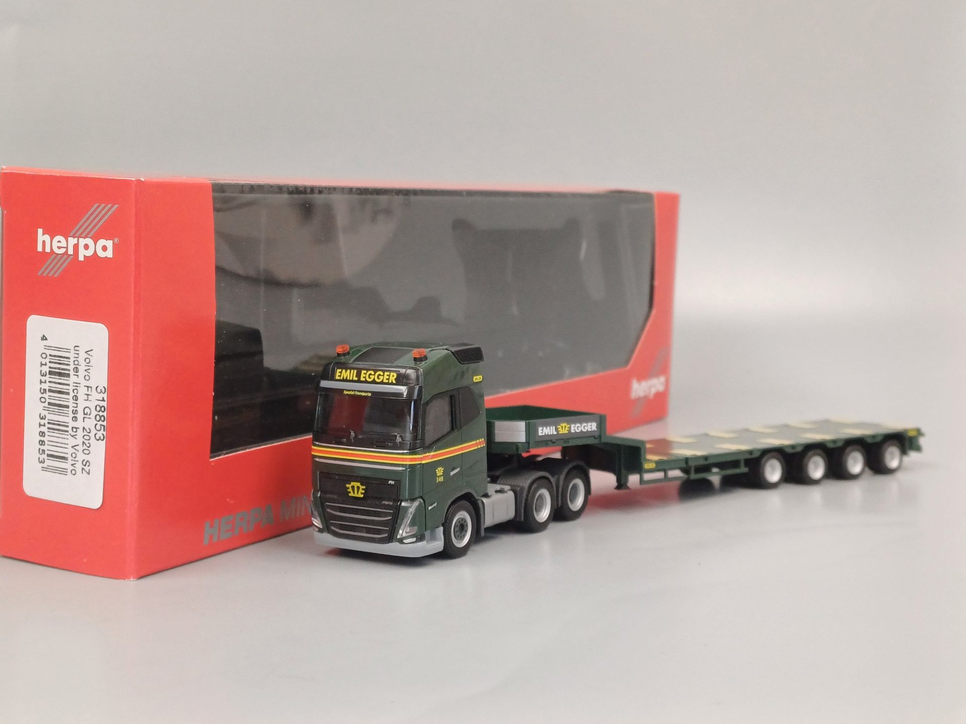 Herpa Volvo FH GL 6x4 Semitieflade Sattelzug Emil Egger